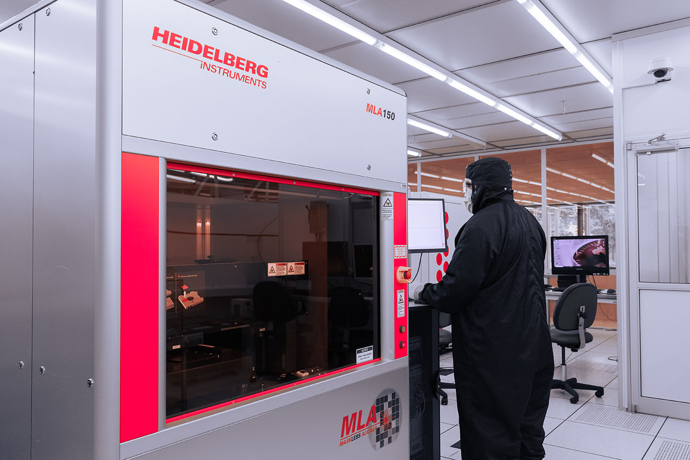 Researcher working in the cleanroom facilities using the Heidelberg MLA 300