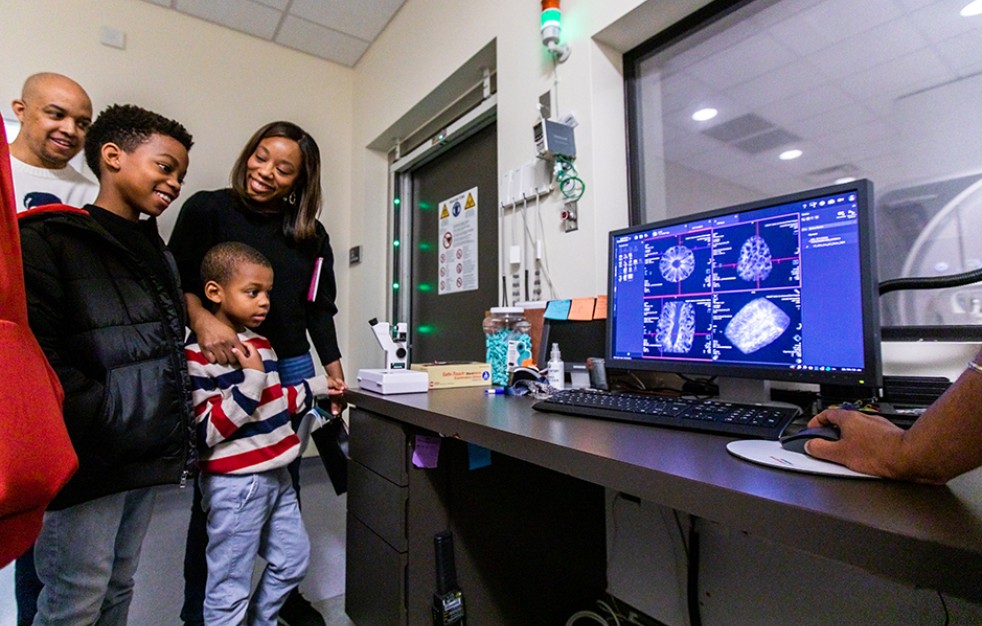 Family looking at brain scans