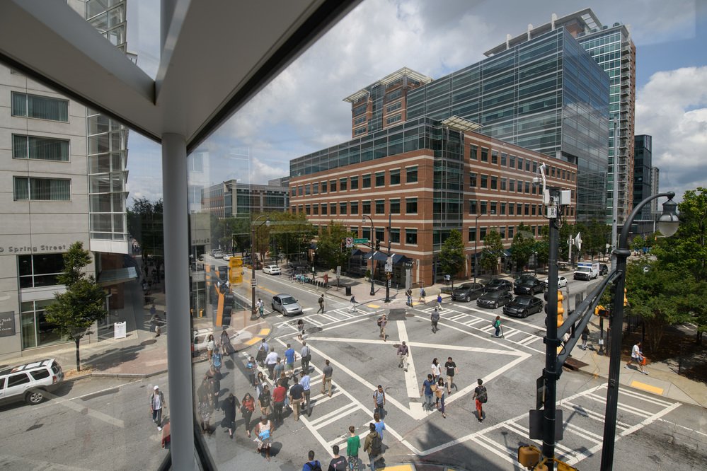 Tech square connects pedestrian and driven vehicles in an urban environment.