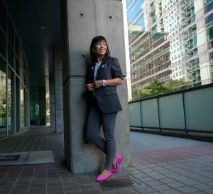 Debra Lam stands outside of the Enterprise Innovation Institute.