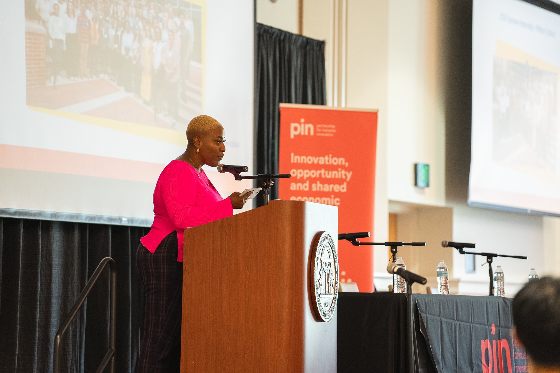 KeAndrea Rivers speaks at the PSI 2024 closing ceremony.